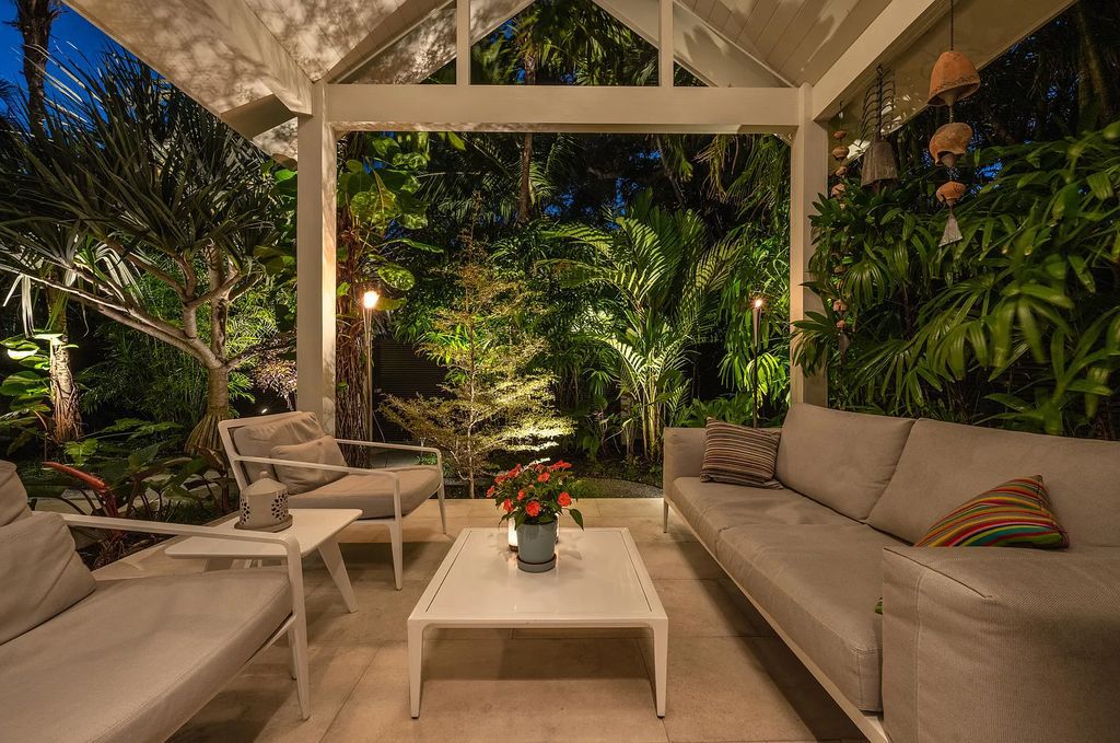 1025 Von Phister Street, Key West, Florida, is located in a sought-after neighborhood offering a tranquil escape. Both in the front and back yards, it is surrounded by lush tropical gardens.