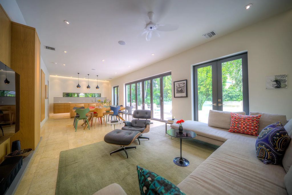 1025 Von Phister Street, Key West, Florida, is located in a sought-after neighborhood offering a tranquil escape. Both in the front and back yards, it is surrounded by lush tropical gardens.