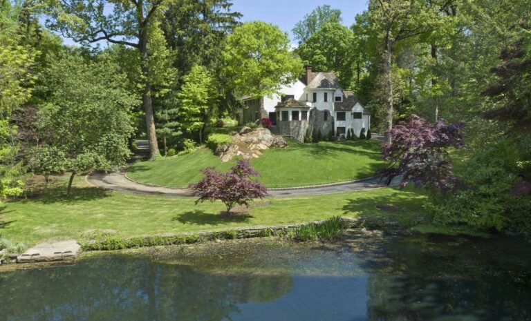 Promising Unrivaled Peace and Privacy on 1.1 Acres, This Gorgeous Lakefront House in Greenwich, CT Asks for $4.95M