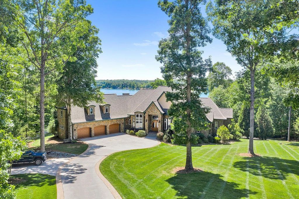 The Estate in Huddleston is a luxurious home featuring stunning, custom built stone exterior now available for sale. This home located at 1114 Shady Point Rd, Huddleston, Virginia; offering 05 bedrooms and 08 bathrooms with 8,813 square feet of living spaces.