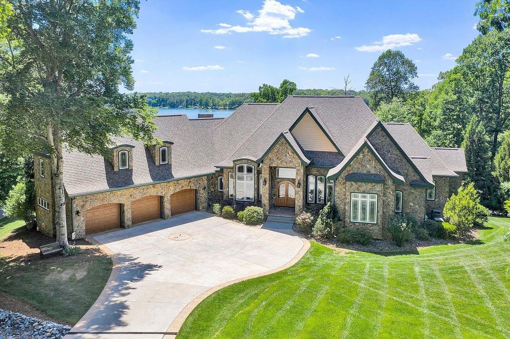 The Estate in Huddleston is a luxurious home featuring stunning, custom built stone exterior now available for sale. This home located at 1114 Shady Point Rd, Huddleston, Virginia; offering 05 bedrooms and 08 bathrooms with 8,813 square feet of living spaces.