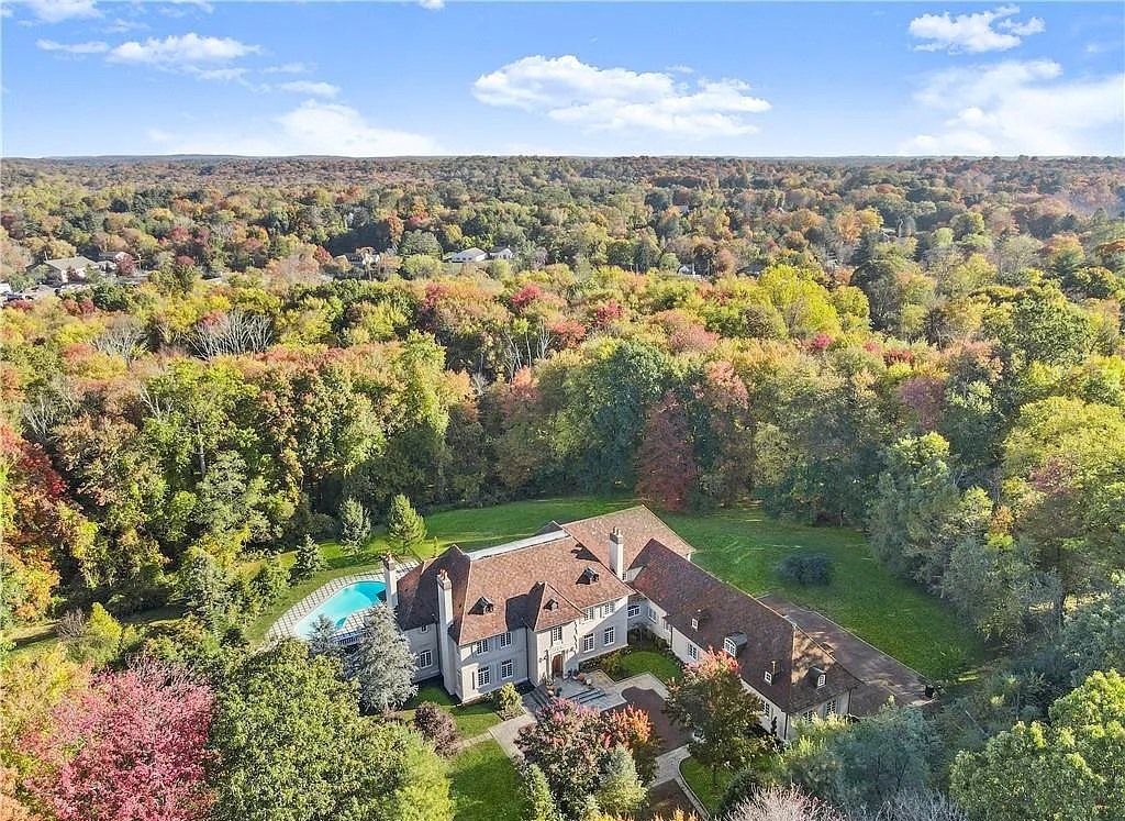 The Chateau in Armonk exudes warmth and luxurious comfort from the minute you enter, now available for sale. This home located at 4 Cowdray Park Drive, Armonk, New York