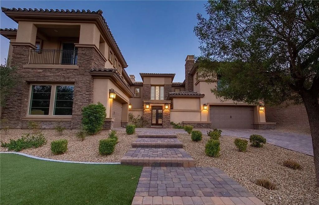 89 Olympia Chase Drive, Las Vegas, Nevada is a stunning executive home in the highly sought-after Southern Highlands Country Club Community with many designer finishes throughout for entertaining and relaxing.