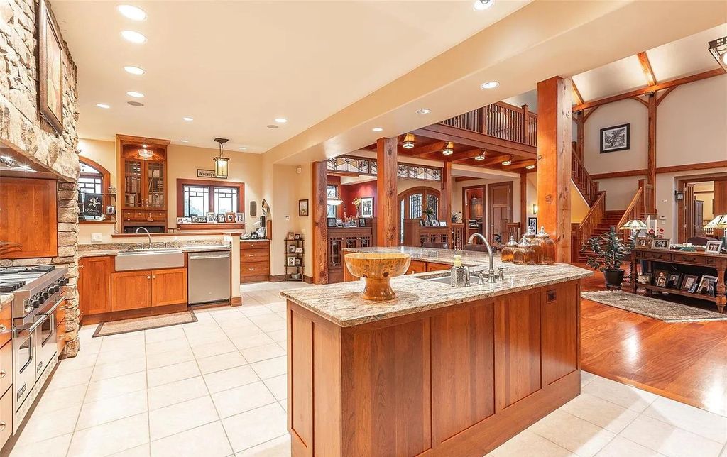 The Estate in Godfrey is a luxurious home with built-in lighting perfect for family fun, now available for sale. This home located at 702 Seiler Rd, Godfrey, Illinois