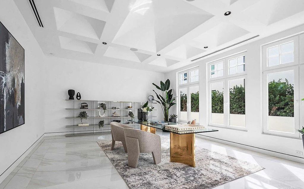 1131 Spanish River Road, Boca Raton, Florida, is the preeminent home available in the most sought-after location. Rebuilt by Marc Julien Homes in 2022, the phenomenal waterfront home features luxurious living space and classic tasteful architecture.