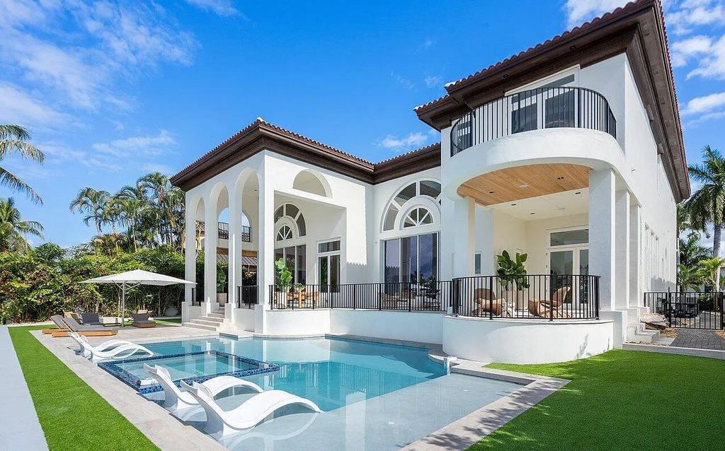 1131 Spanish River Road, Boca Raton, Florida, is the preeminent home available in the most sought-after location. Rebuilt by Marc Julien Homes in 2022, the phenomenal waterfront home features luxurious living space and classic tasteful architecture.