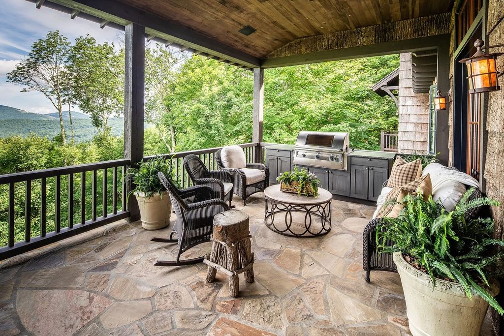 The Estate in Banner Elk is unparalleled with its scenic setting of gorgeous rock outcroppings, beautiful landscape, and astonishing views of the mountain, now available for sale. This home located at 1782 Rockrose, Banner Elk, North Carolina