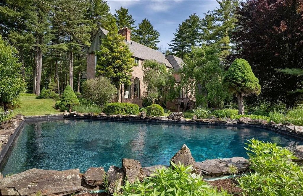 The Home in Salisbury boasts breathtaking views, specimen trees, and a tranquil ambiance, now available for sale. This home located at 69 Beaver Dam Rd, Salisbury, Connecticut
