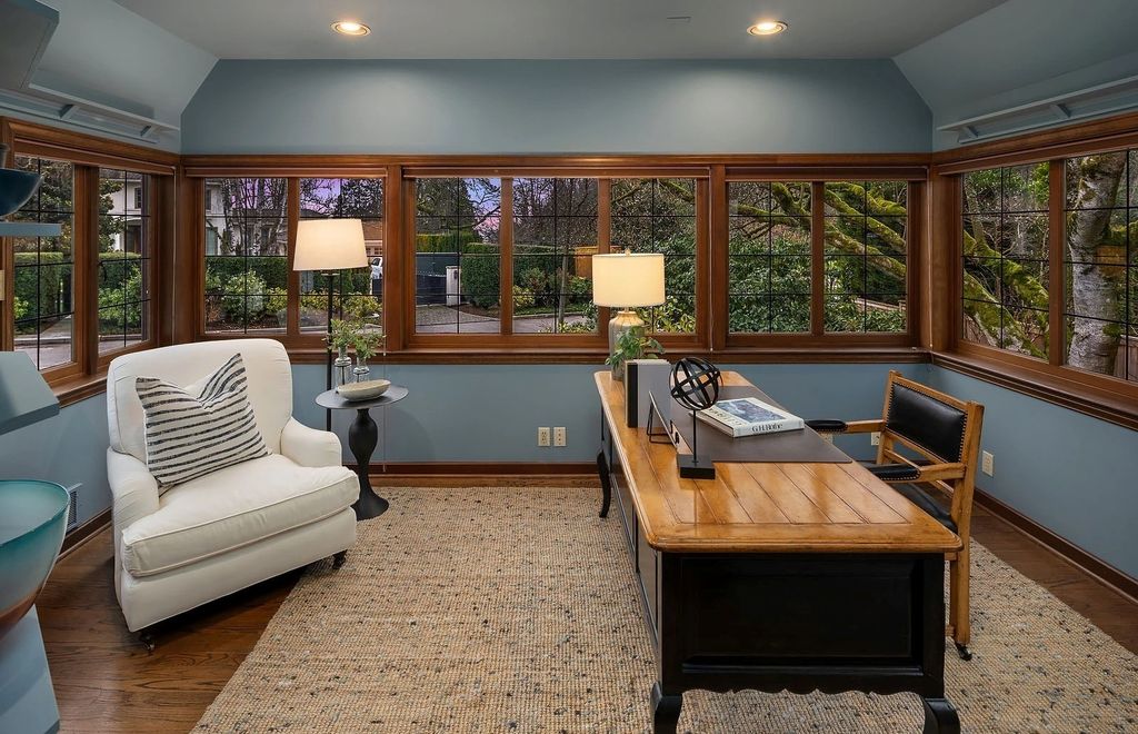 The House in Seattle meets modern amenities like the easy flow to outdoor courtyards for entertaining and plenty of space for your in-home offices, now available for sale. This home located at 5560 NE Ambleside Road, Seattle, Washington