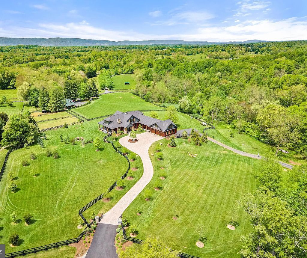 The Estate in Middleburg is a luxurious home of uncompromising quality and extraordinary beauty now available for sale. This home located at 34627 Atoka Chase Ln, Middleburg, Virginia; offering 05 bedrooms and 07 bathrooms with 11,736 square feet of living spaces.