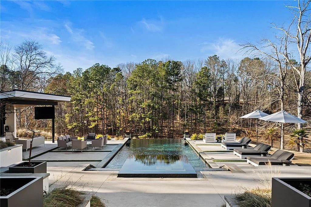 The Masterpiece in Marietta boasts all of todays modern finishes and expectations, now available for sale. This home located at 660 Atlanta Country Club Dr SE, Marietta, Georgia