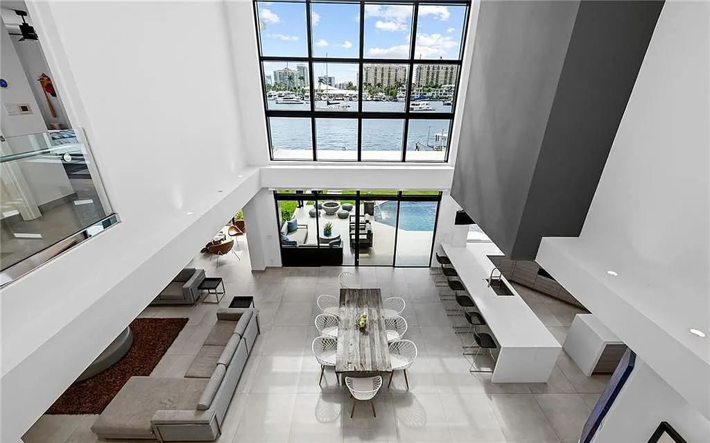 1304 Seminole Drive, Fort Lauderdale, Florida is situated on 80' of waterfront with modern lifestyle and open concept living. It has an ideal kitchen and outdoor living space for entertaining.