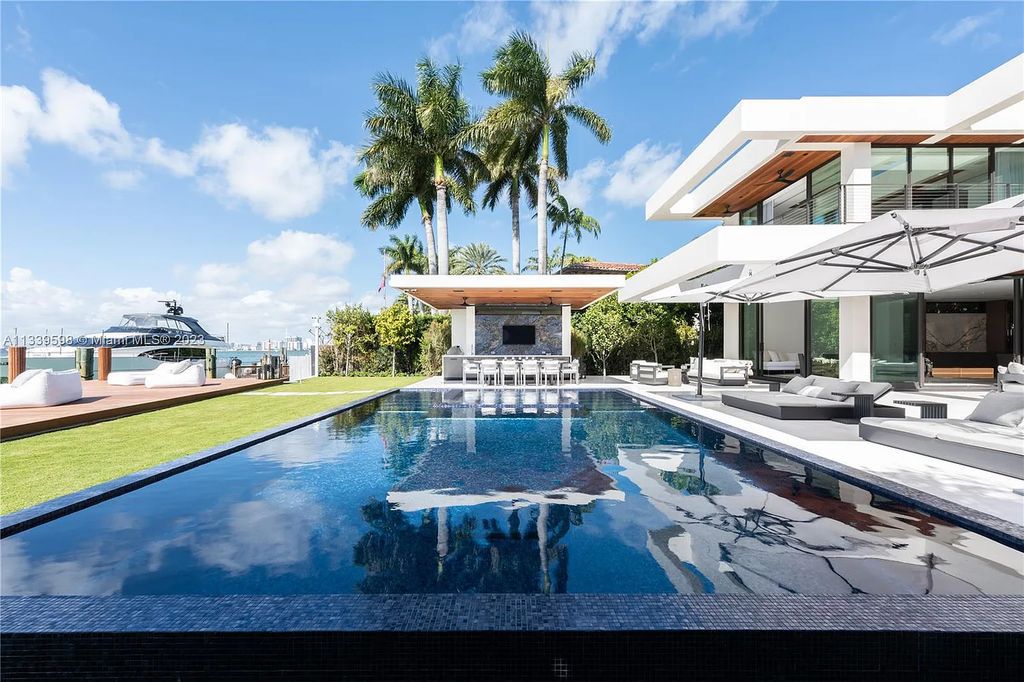 5718 N Bay Road, Miami Beach, Florida, is the perfect residence for luxury living. It features high-luxury furnishings and unmatched indoor/outdoor living spaces.