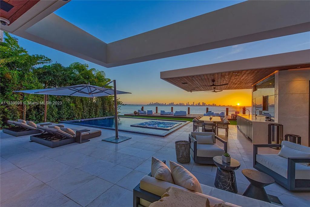 5718 N Bay Road, Miami Beach, Florida, is the perfect residence for luxury living. It features high-luxury furnishings and unmatched indoor/outdoor living spaces.
