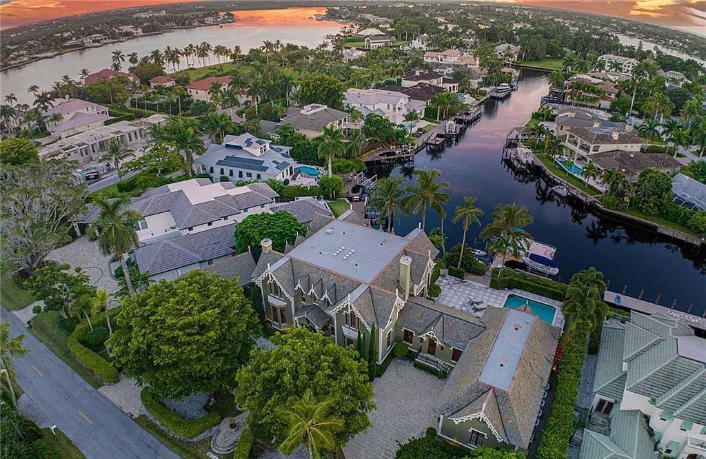 730 21st Ave S, Naples, Florida, is a one-of-a-kind waterfront home located between Old Naples and Port Royal. It features a palatial pool, an outdoor fountain, and over 130 feet of natural bliss.
