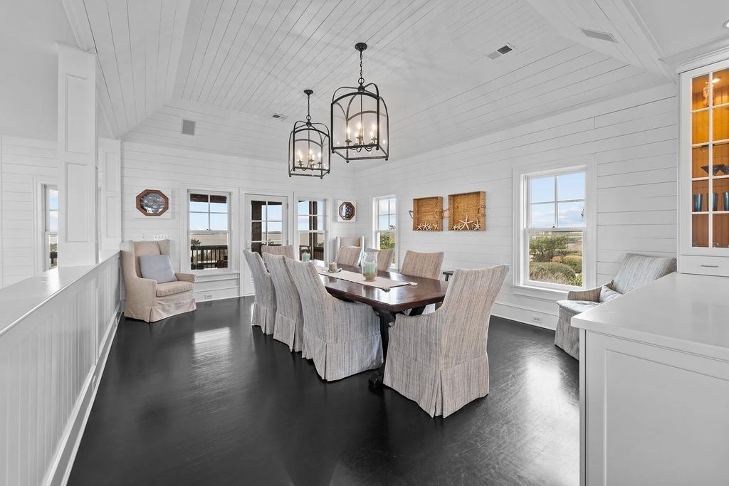 The Estate in Duck provides plenty of space for enjoying the sunrise over the ocean, now available for sale. This home located at 112 S Baum Trl, Duck, North Carolina