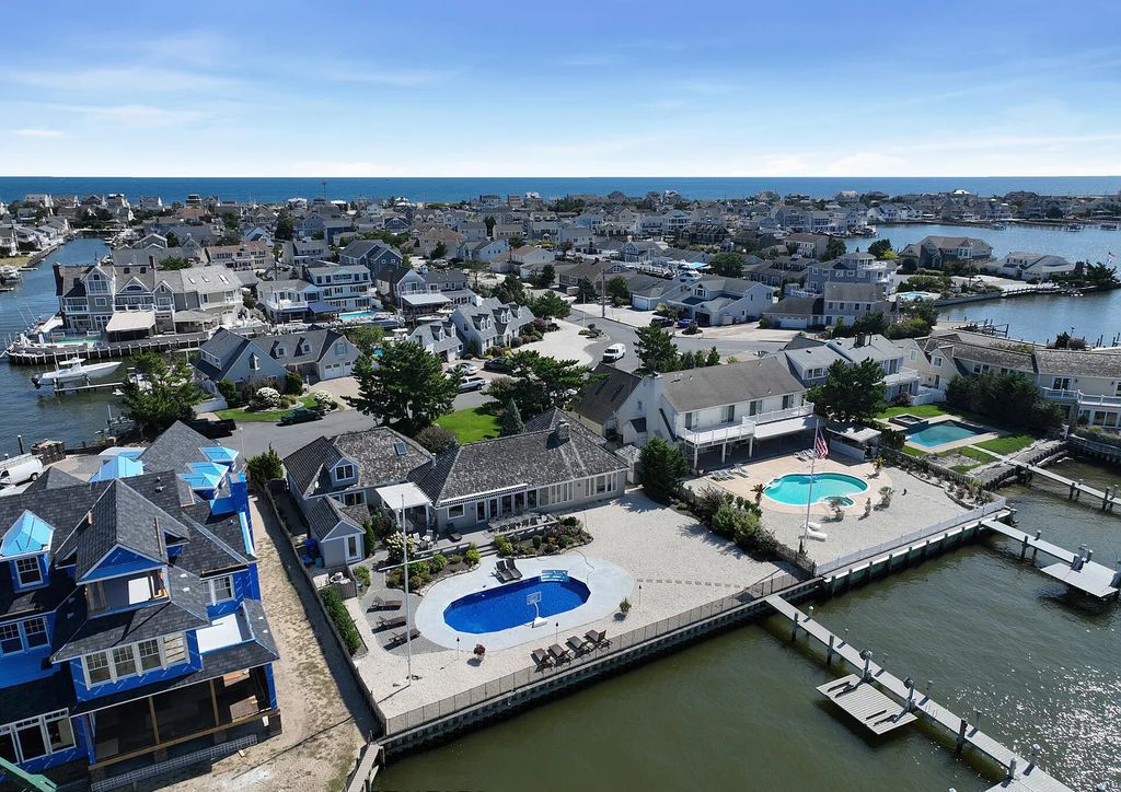 The Estate in Mantoloking is a luxurious home of exceptional entertaining space on one of the most coveted streets at the Jersey Shore now available for sale. This home located at 349 Tide Pond Road, Mantoloking, New Jersey; offering 05 bedrooms and 06 bathrooms with 2,952 square feet of living spaces.