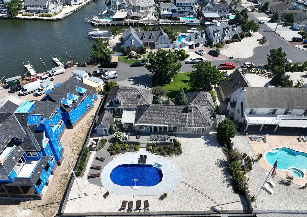 The Estate in Mantoloking is a luxurious home of exceptional entertaining space on one of the most coveted streets at the Jersey Shore now available for sale. This home located at 349 Tide Pond Road, Mantoloking, New Jersey; offering 05 bedrooms and 06 bathrooms with 2,952 square feet of living spaces.