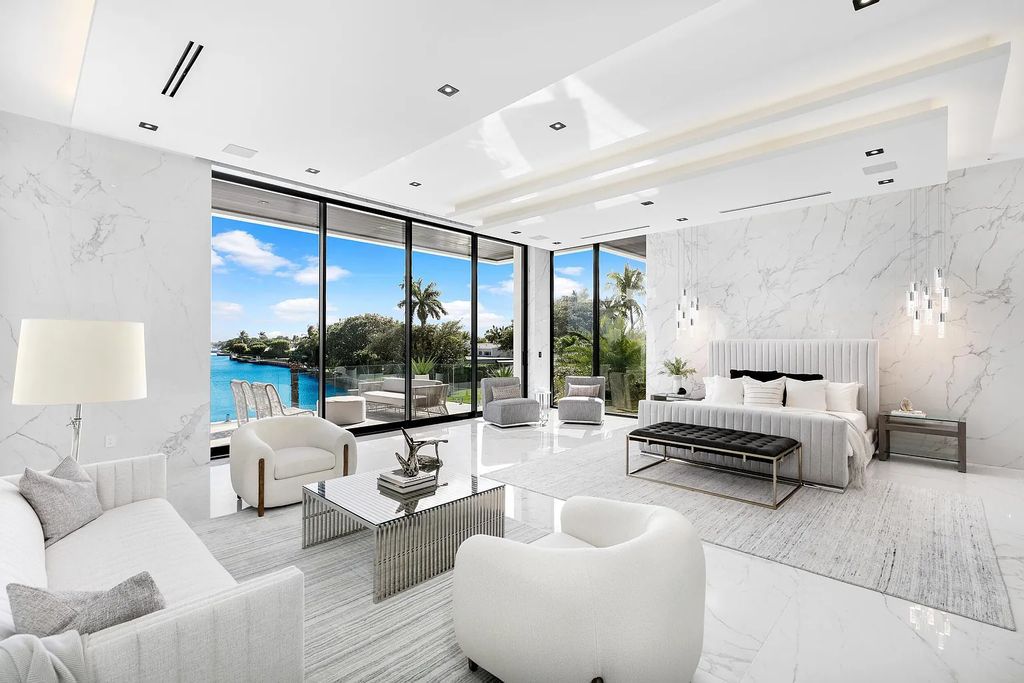 The Churchill Estate at 110 Churchill Way in Manalapan, Florida is a magnificent masterpiece of modern living. Built in 2021, this gated waterfront mansion boasts 6 bedrooms, 9 bathrooms, and over 15,000 square feet of living space on a 0.74-acre lot.