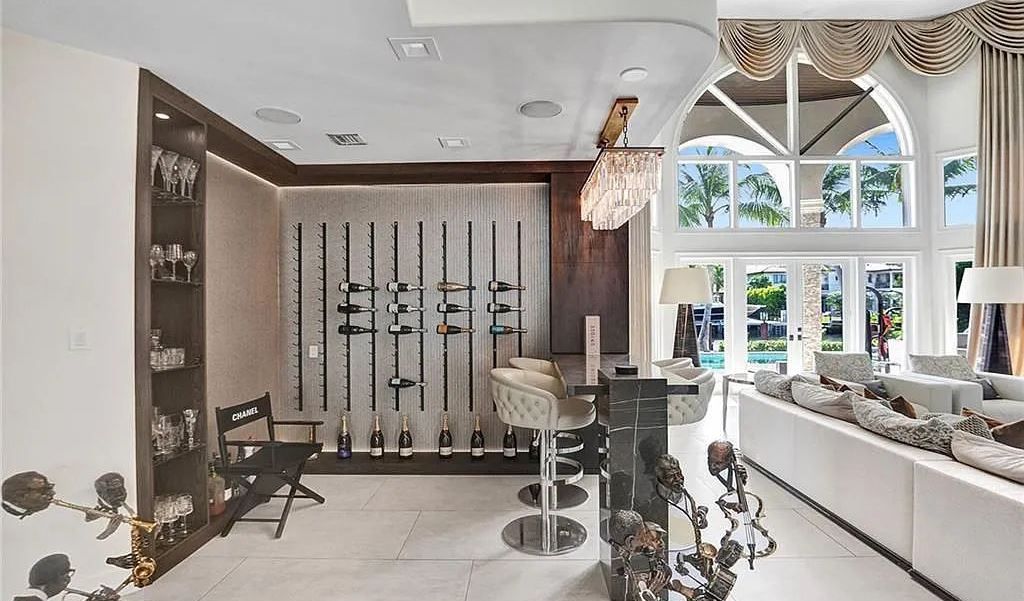 Discover a life of luxury and sophistication at 34 Isla Bahia Drive in Fort Lauderdale, Florida. This luxurious home boasts 6 bedrooms and 8 bathrooms, with over 8,000 square feet of living space situated on a spacious 0.30-acre lot.