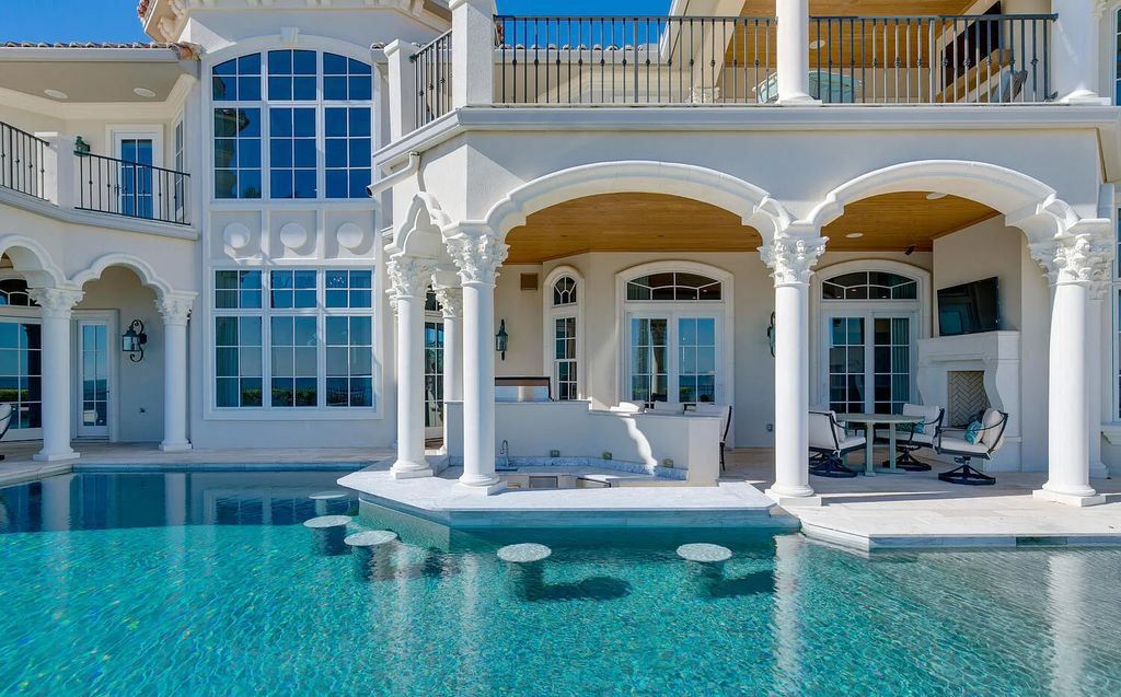 Experience the ultimate in luxury with this exquisite oceanfront estate located at 801 Ponte Vedra Boulevard, Ponte Vedra Beach, Florida. Designed with entertaining in mind, this custom-built home offers 6 bedrooms, 9 bathrooms, and over 9,200 square feet of living space.