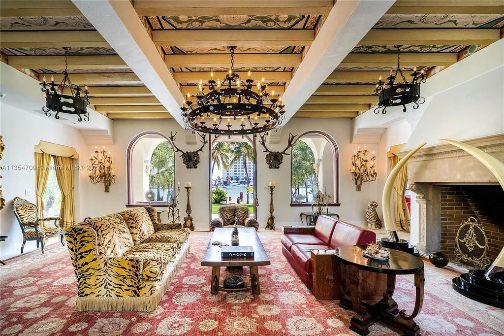 Villa Crono is a stunning Mediterranean-style estate located at 4731 Pine Tree Drive in Miami Beach, Florida. The property features 9 bedrooms, 9 bathrooms, and 9,605 square feet of living space on a rare 42,600 square foot lot with 100 feet of water frontage and no fixed bridges.