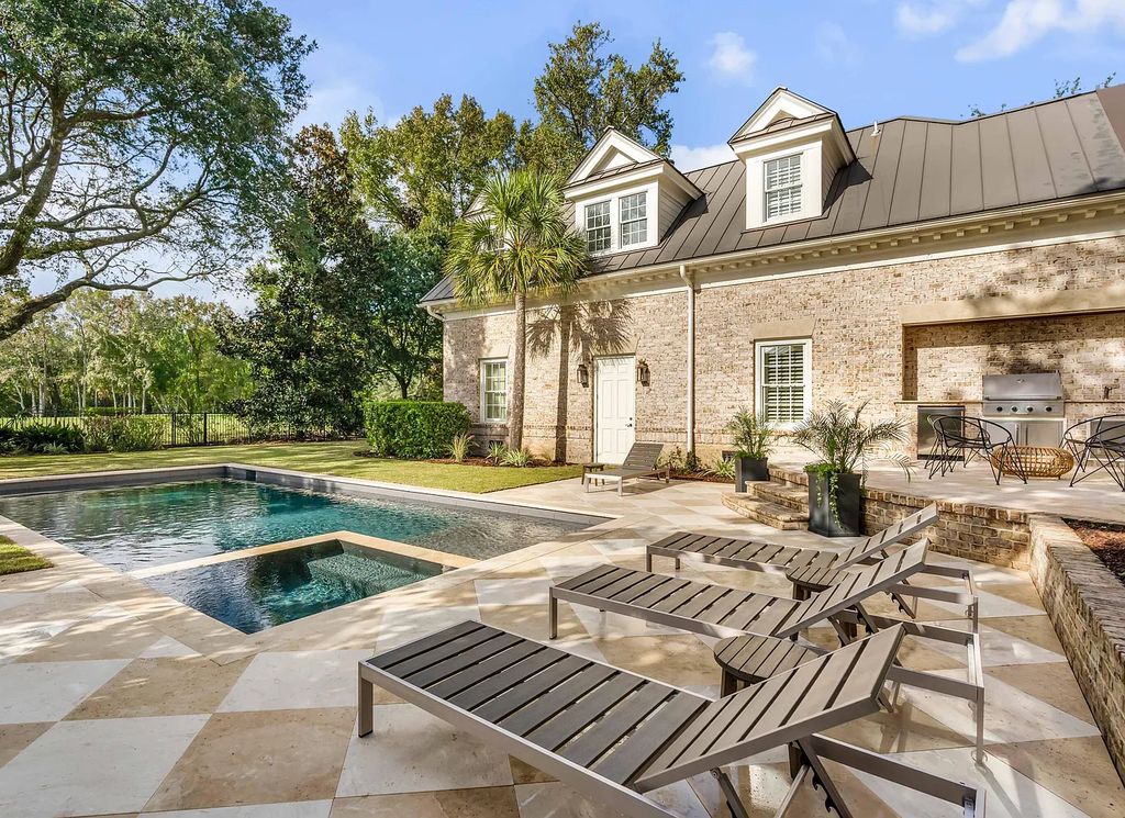 The Estate in Charleston is a luxurious home offering rare front and back unobstructed golf course views now available for sale. This home located at 59 Iron Bottom Ln, Charleston, South Carolina; offering 06 bedrooms and 08 bathrooms with 8,191 square feet of living spaces.