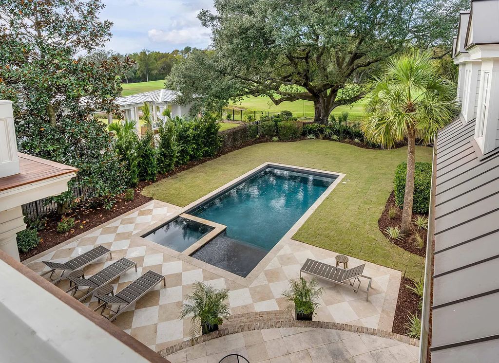 The Estate in Charleston is a luxurious home offering rare front and back unobstructed golf course views now available for sale. This home located at 59 Iron Bottom Ln, Charleston, South Carolina; offering 06 bedrooms and 08 bathrooms with 8,191 square feet of living spaces.