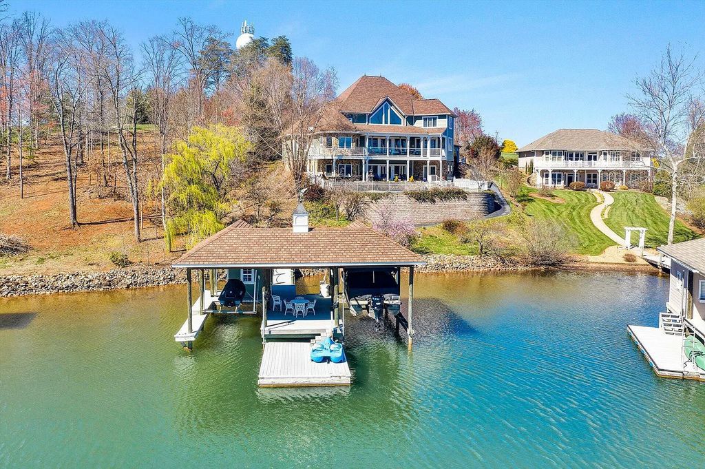 The Estate in Moneta is a luxurious home that immediately draw you to the magnificent lake and mountain views now available for sale. This home located at 77 Pacific Ave, Moneta, VA 24121, Virginia; offering 05 bedrooms and 06 bathrooms with 5,951 square feet of living spaces. 