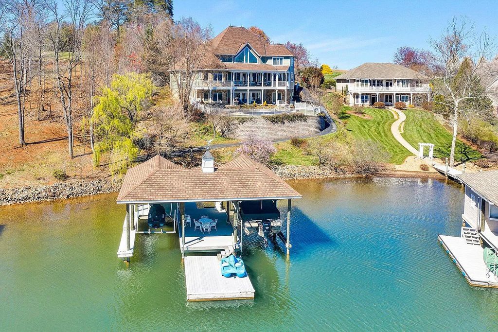 The Estate in Moneta is a luxurious home that immediately draw you to the magnificent lake and mountain views now available for sale. This home located at 77 Pacific Ave, Moneta, VA 24121, Virginia; offering 05 bedrooms and 06 bathrooms with 5,951 square feet of living spaces. 