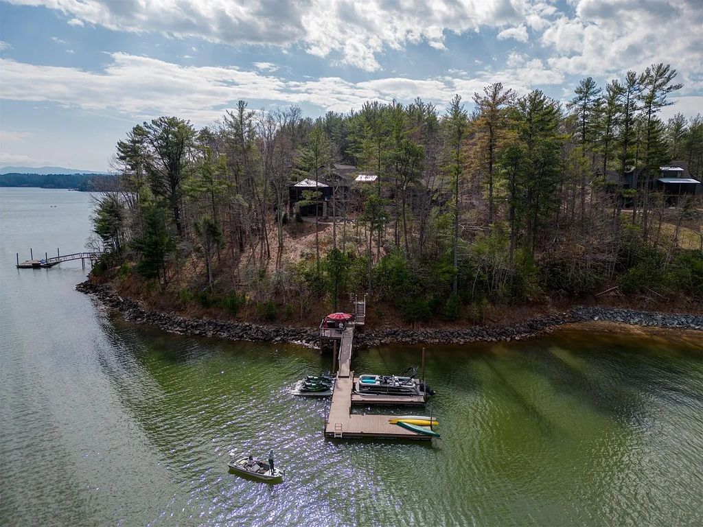 The Home in Nebo is a luxurious home with best views on the lake, now available for sale. This home located at 2006 Old Wildlife Club Dr, Nebo, North Carolina