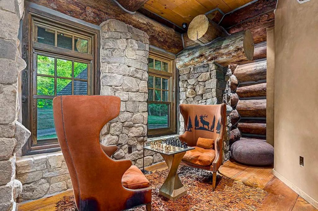 The Home in Millbrook is constructed of standing dead timber from the west and immense stone from Pennsylvania, now available for sale. This home located at 521 Stanford Rd, Millbrook, New York