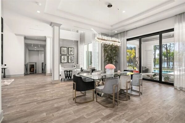 View of Luxury Lakefront Mansion with Private Basketball Court and Stunning ...