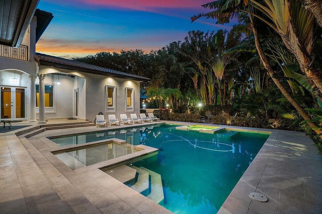 Introducing a stunning house at 14 E Ocean Avenue, located in the highly sought-after area of Boynton Beach, Florida. This luxurious property boasts 6 spacious bedrooms and 7 modern bathrooms, perfect for accommodating large families or hosting guests.
