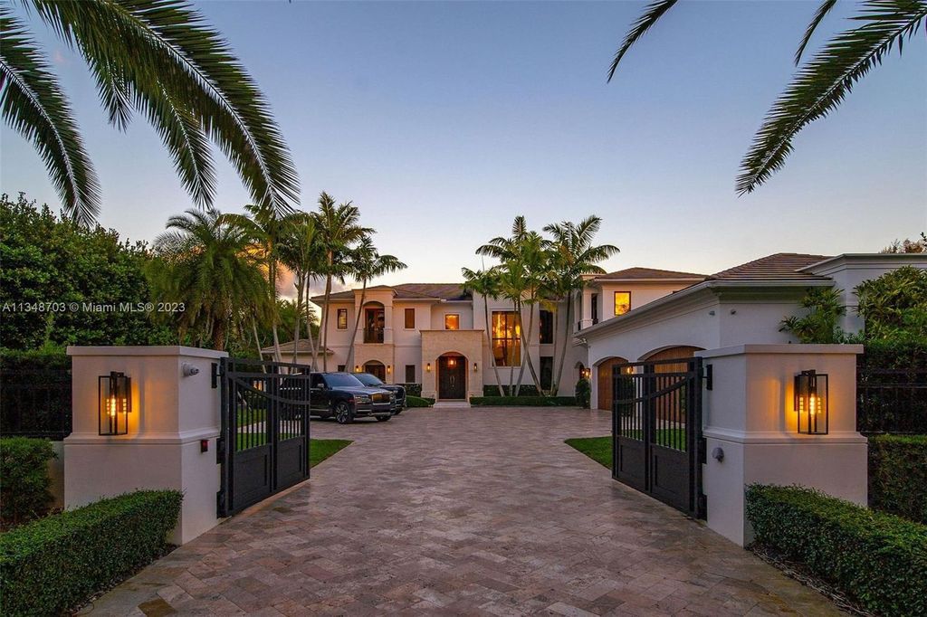 Welcome to 8955 SW 63rd Court in Pinecrest, Florida - an opulent oasis in the sought-after Stritter Estates community. This stunning 6-bedroom, 10-bathroom home boasts over 7,700 square feet of luxurious living space, situated on a sprawling 0.87-acre lot. Built in 2013, this home in Pinecrest is as functional as it is beautiful.