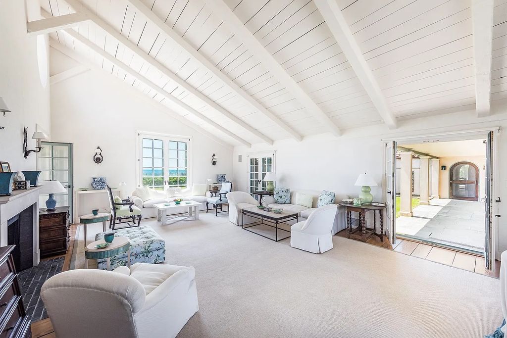 The House in East Hampton includes oceanside pool, extensive terraces and second floor deck taking full advantage of the panoramic views now available for sale. This home located at 201 Lily Pond Ln, East Hampton, New York