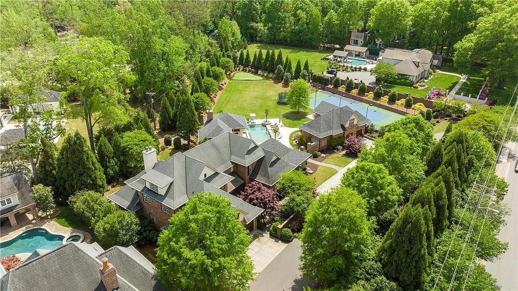The Estate in Charlotte is a custom-built unique home designed by well-known architect Harry Schrader, now available for sale. This home located at 8402 Fairview Rd, Charlotte, North Carolina