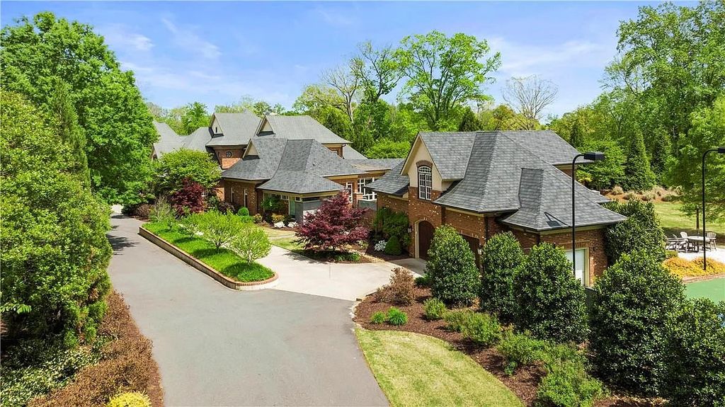 The Estate in Charlotte is a custom-built unique home designed by well-known architect Harry Schrader, now available for sale. This home located at 8402 Fairview Rd, Charlotte, North Carolina