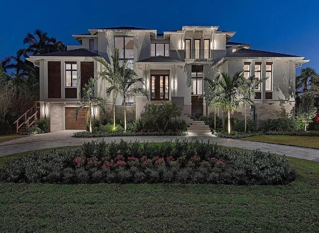 This stunning house located at 2060 Gordon Drive, Naples, Florida, is now available for sale. The newly completed residence is part of a unique, gated beachfront enclave consisting of nine homes, making it a highly coveted property.
