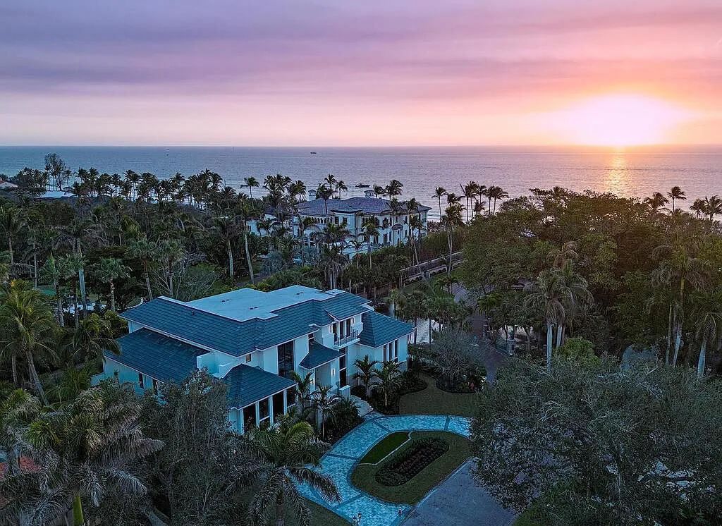 This stunning house located at 2060 Gordon Drive, Naples, Florida, is now available for sale. The newly completed residence is part of a unique, gated beachfront enclave consisting of nine homes, making it a highly coveted property.