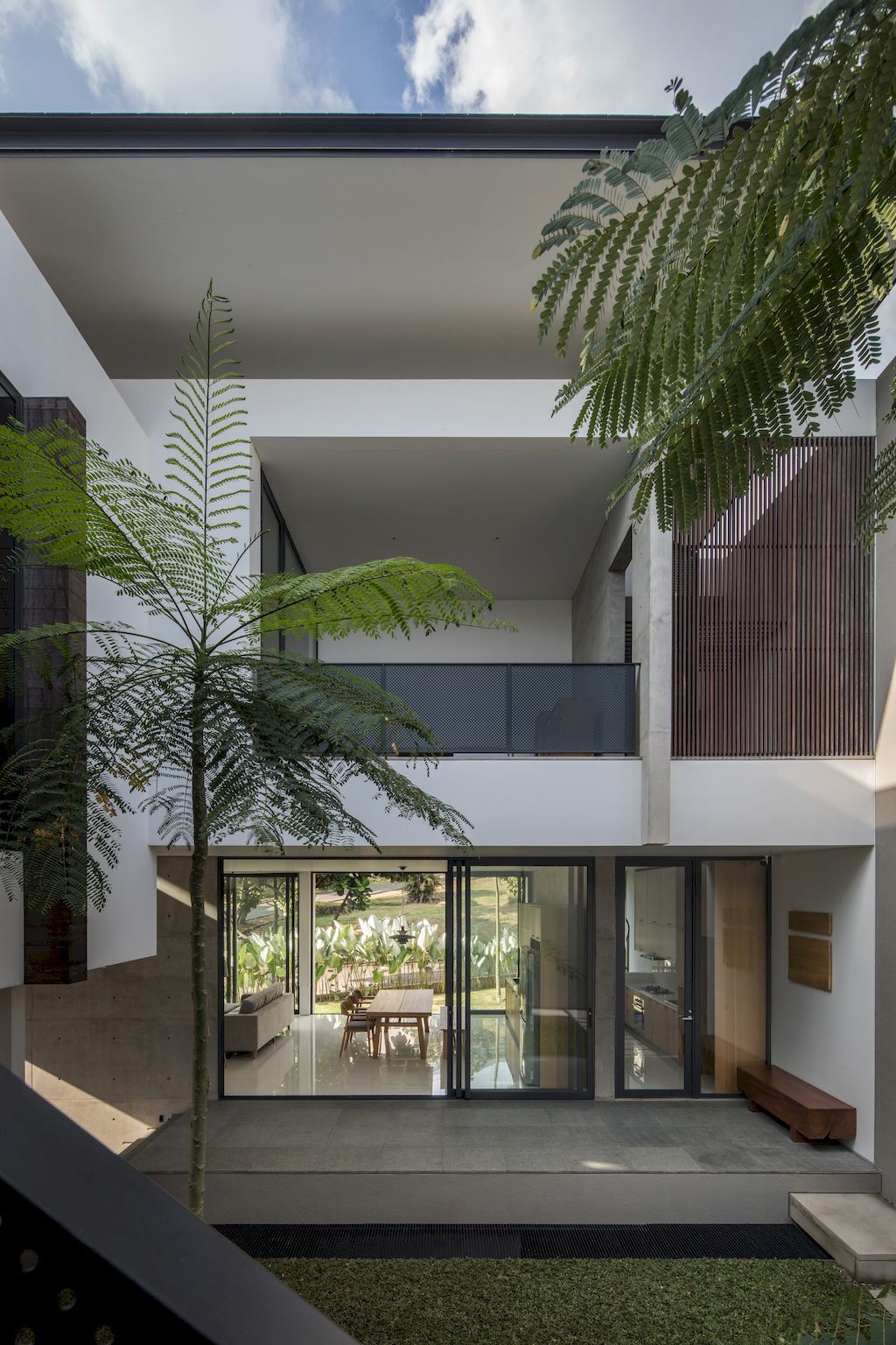 Springhills House creates comfortable living spaces by Pranala Associates