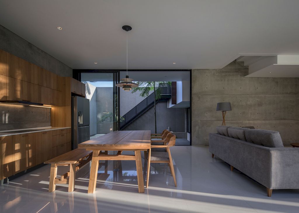 Springhills House creates comfortable living spaces by Pranala Associates