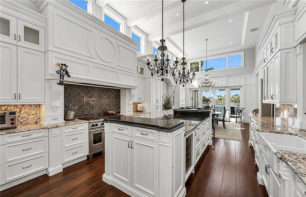 This stunning Greek Revival-style home located at 225 Cove Lane in Naples, Florida is a true masterpiece inspired by the timeless charm of New Orleans. The 4-bedroom, 7-bathroom, 7,454 square foot custom estate features long water views across the sheltered cove and quick access to the Gulf via Gordon Pass.