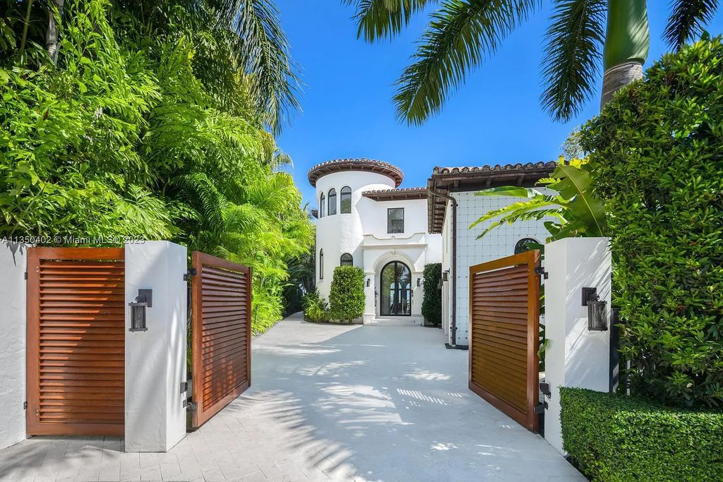 Welcome to 815 E Dilido Drive, Miami Beach, Florida, a stunning transitional home designed by Menin Design. This hme in Miami Beach boasts 6 bedrooms and 8 bathrooms, with a living space of 8,181 square feet, all situated on a spacious 0.31-acre lot. Built in 2006, this home is one of the most impressive properties on the Venetian, offering 107 feet of waterfront living.