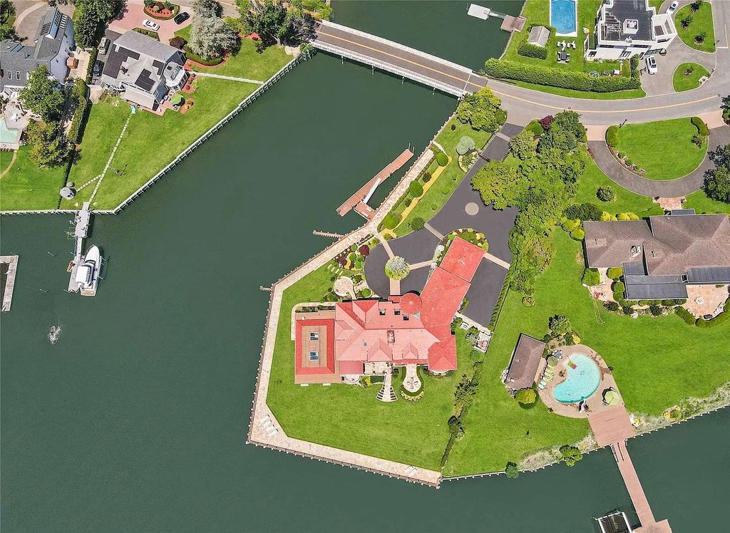 The Estate in Hewlett Harbor was carefully designed for grand-scale entertaining as well as comfortable day-to-day living, now available for sale. This home located at 1101 Harbor Road, Hewlett Harbor, New York