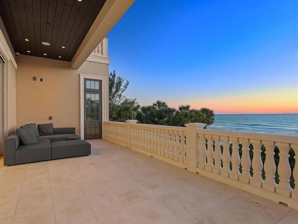 This stunning 2018-built gulf front estate is located at 3909 Casey Key Road in Nokomis, Florida. Boasting 4 bedrooms, 6 bathrooms, and a sprawling living space of 6,335 square feet on a 0.53-acre lot, this refined and elegant home offers breathtaking views of the Gulf of Mexico from the expansive walls of glass.