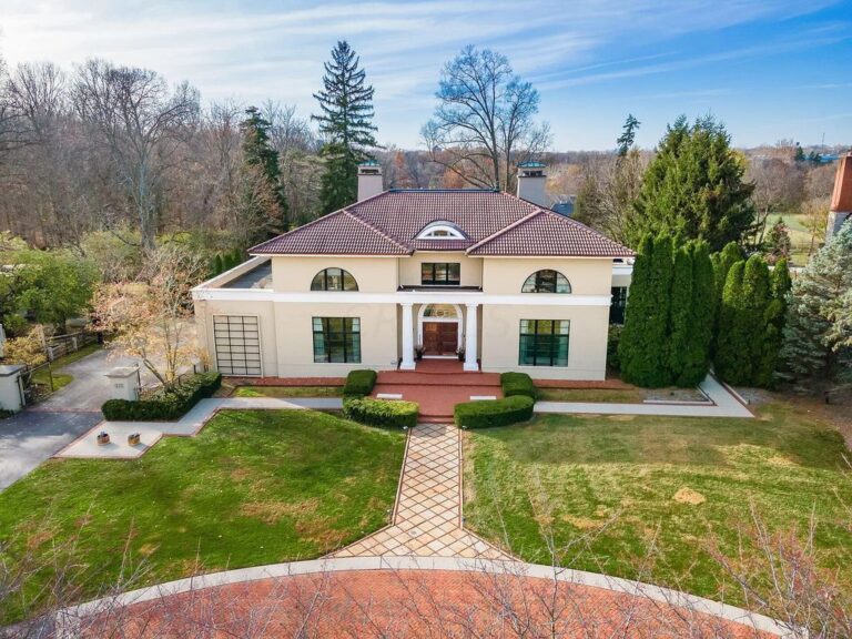 This $2.295M Highly Desirable Home in  Columbus, OH Features Beautiful Stucco Exterior and Abundant Landscaping