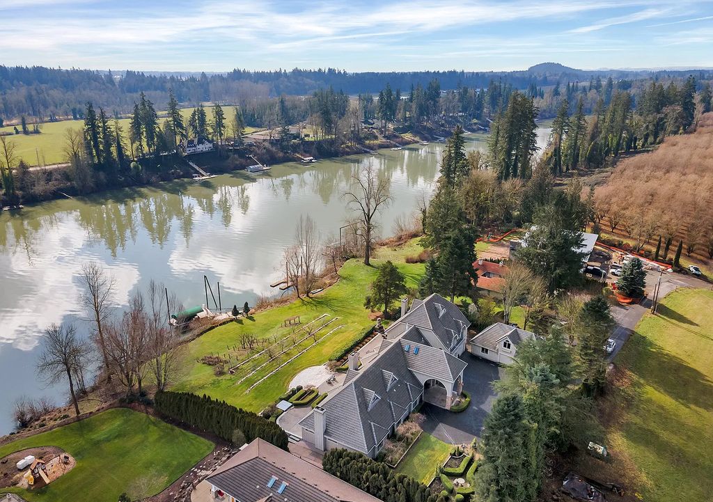 The Estate in Wilsonville is a luxurious home providing a secluded retreat yet with maximal river views now available for sale. This home located at 12300 SW Riverview Ln, Wilsonville, Oregon; offering 04 bedrooms and 04 bathrooms with 5,886 square feet of living spaces.