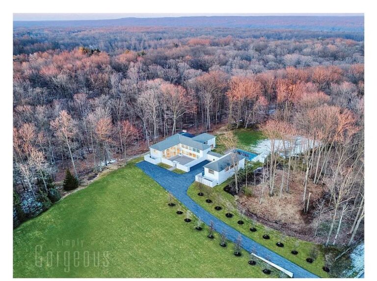 This 2,850,000 Estate Simply Glows both Night and Day with Great Light