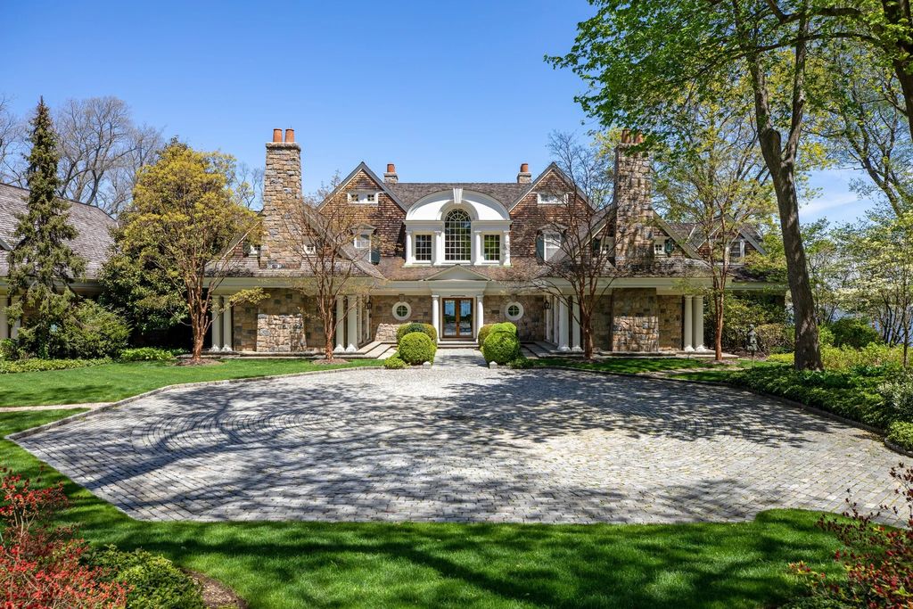 The Estate in Great Neck is build by award-winning architecture firm, Shope Reno Wharton Associates, now available for sale. This home located at 227 Dock Lane, Great Neck, New York